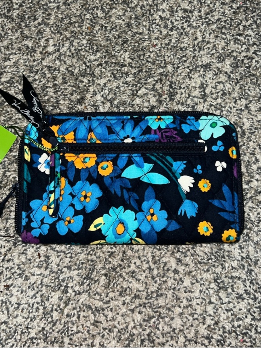 Vera Bradley Navy Floral Quilted Zip Wallet with Turquoise and Yellow Accents.